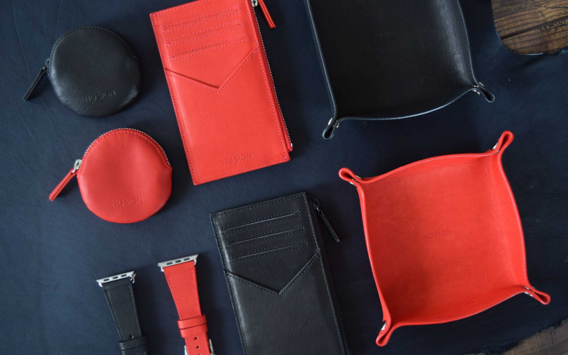 NO SIGN時尚皮革名片長夾黑色.紅色／定價8,200元、特價5,300元（圖／業者提供）