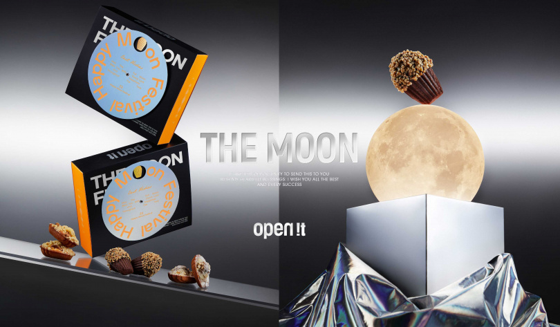 「THE MOON」禮盒視覺融合了氣勢磅礴的宇宙感，每顆瑪德蓮都像獨特小隕石一樣衝擊味蕾。（792～980元，圖／open it.提供）