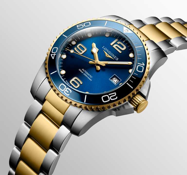LONGINES「HydroConquest深海征服者」系列腕錶，藍色面盤款，41mm，不鏽鋼與金色PVD錶殼╱58,800元。（圖╱LONGINES提供）