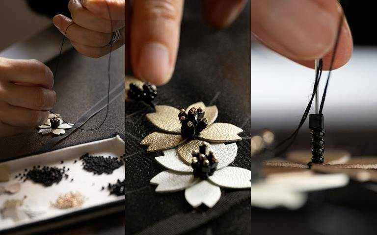 每一朵櫻花都需以手工縫製耗時1個半小時才能完成。(圖／品牌提供)