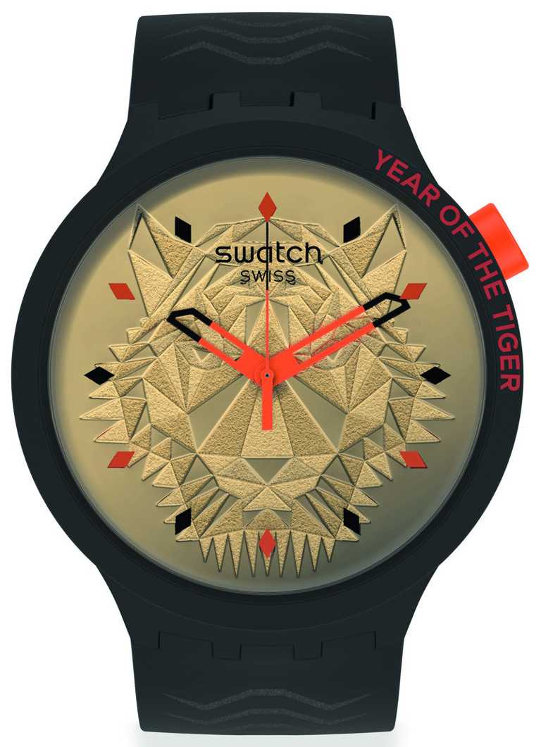 Swatch「Tiger Power 2022虎虎生風」虎年生肖特別版腕錶，錶盤以虎頭造型為主題，展現巧妙層次設計。（圖╱Swatch提供）