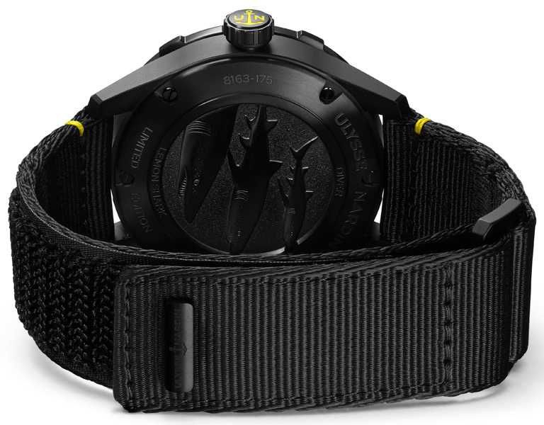 ULYSSE NARDIN「Diver Lemon Shark」檸檬鯊潛水錶，錶背壓印3隻栩栩如生的檸檬鯊圖案，搭配完全採用回收漁網製成的黑色R-Strap錶帶。（圖╱ULYSSE NARDIN提供）