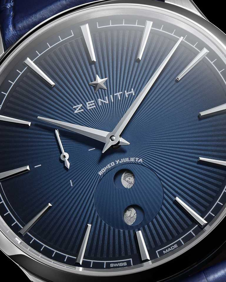 午夜藍漸變帶太陽紋飾錶盤，刻有羅密歐與茱麗葉品牌印記頭像的月亮。（圖╱ZENITH提供）