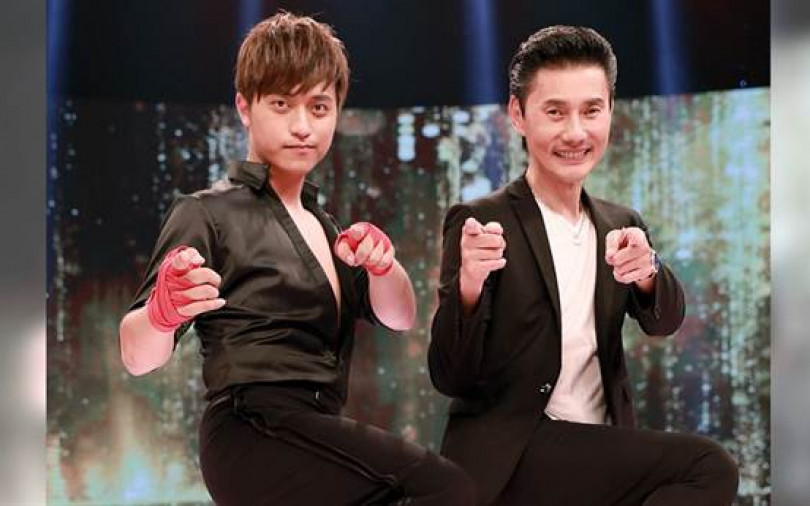 包庭政練國標　遭扯髮挨揍